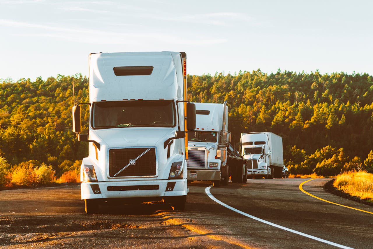 Convoy of American semi trucks on a highway